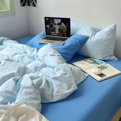 Sky Blue Bedding Set with laptop movie setup