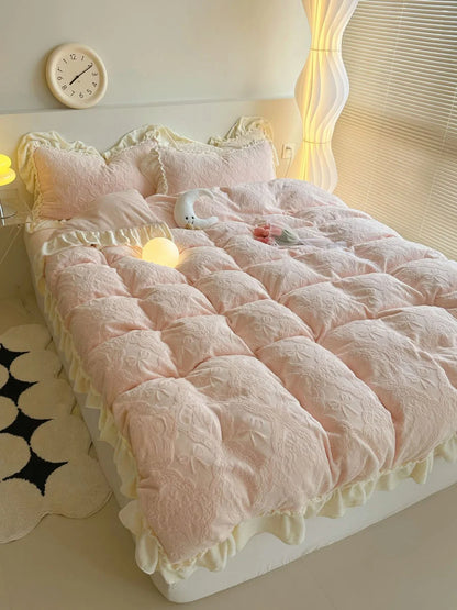 Angled shot of the Pastel Pink Ruffled Bedding Set, highlighting its volume and soft drape on the bed - RoomDen.