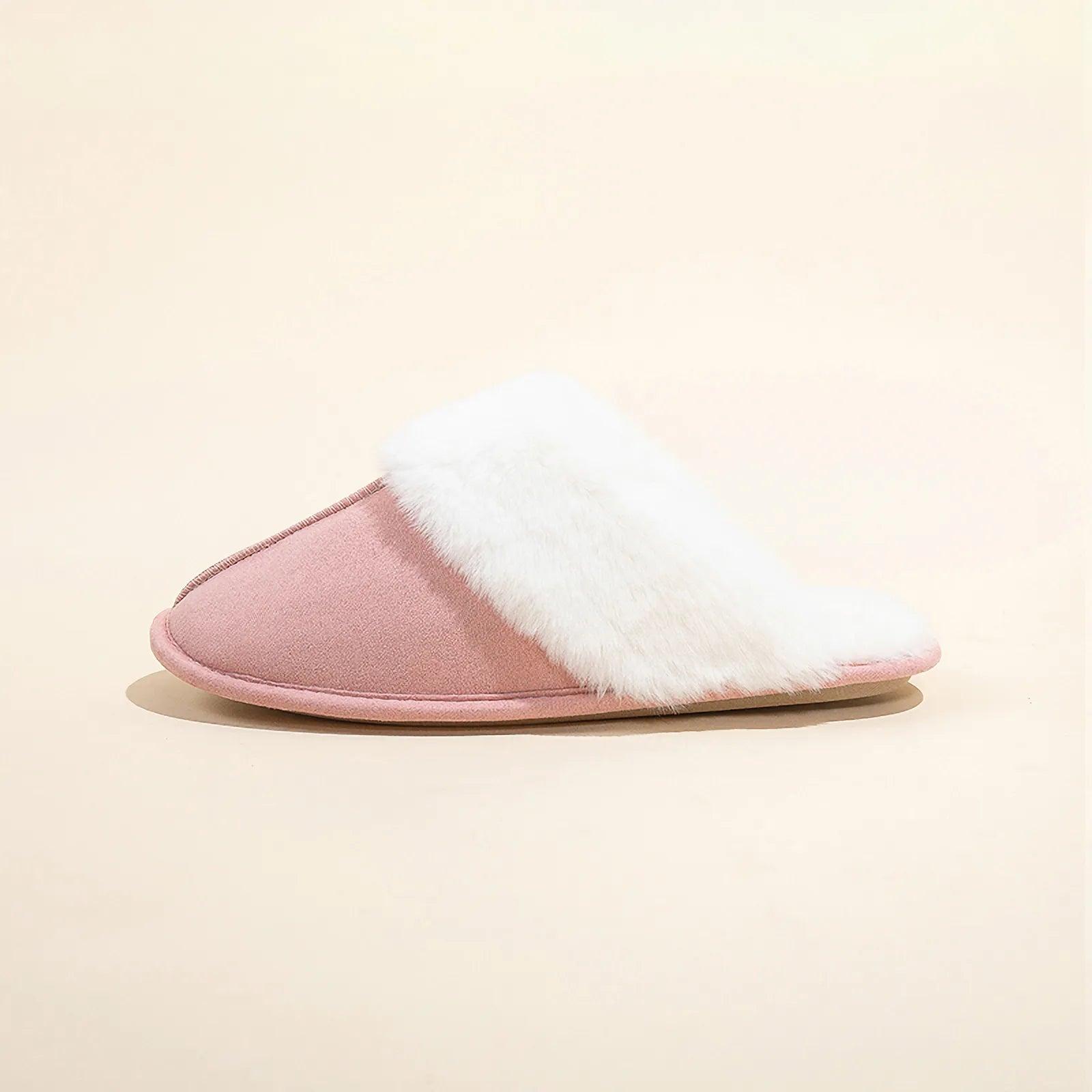 Side profile of Pink Plush Faux Suede House Slipper showing fluffy white lining.