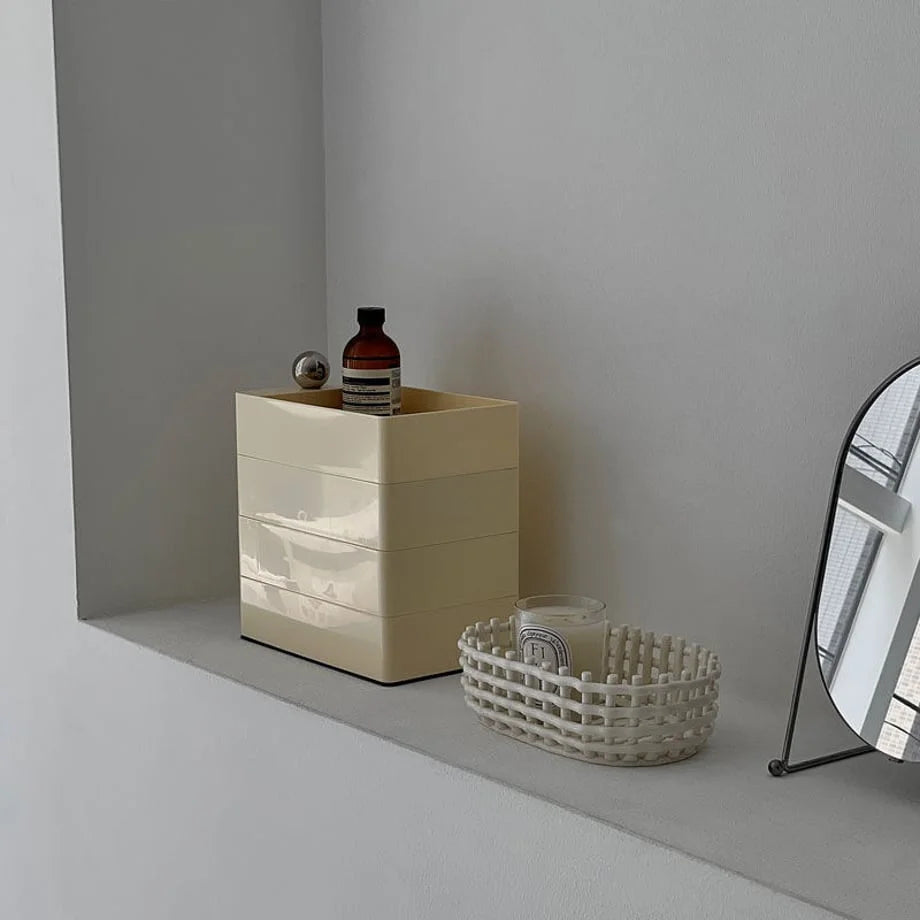 The Cream Beige makeup organizer from a slightly different angle, showing its glossy finish.
