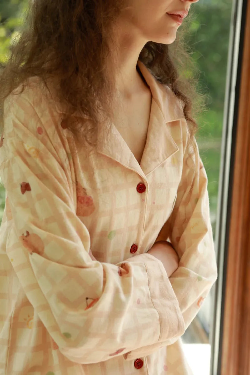 Close-up of Washed Cotton Fabric with Cute Capybara Print and Red Buttons - RoomDen
