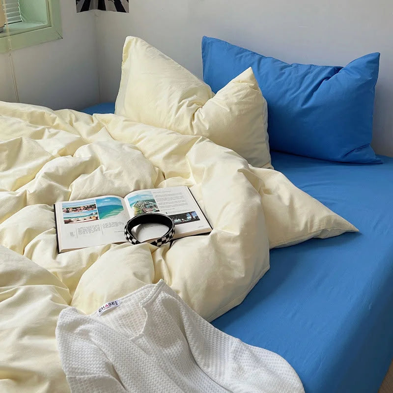 Aesthetic Yellow and Blue Bedding styling with open book