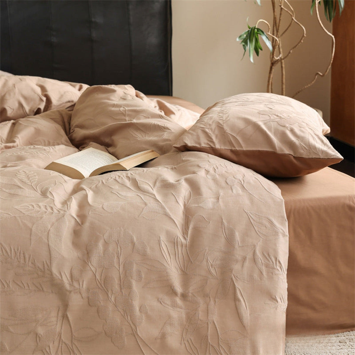 Brushed cotton jacquard bedding set – Apricot Orchid, close view of jacquard fabric and pillows - Roomden