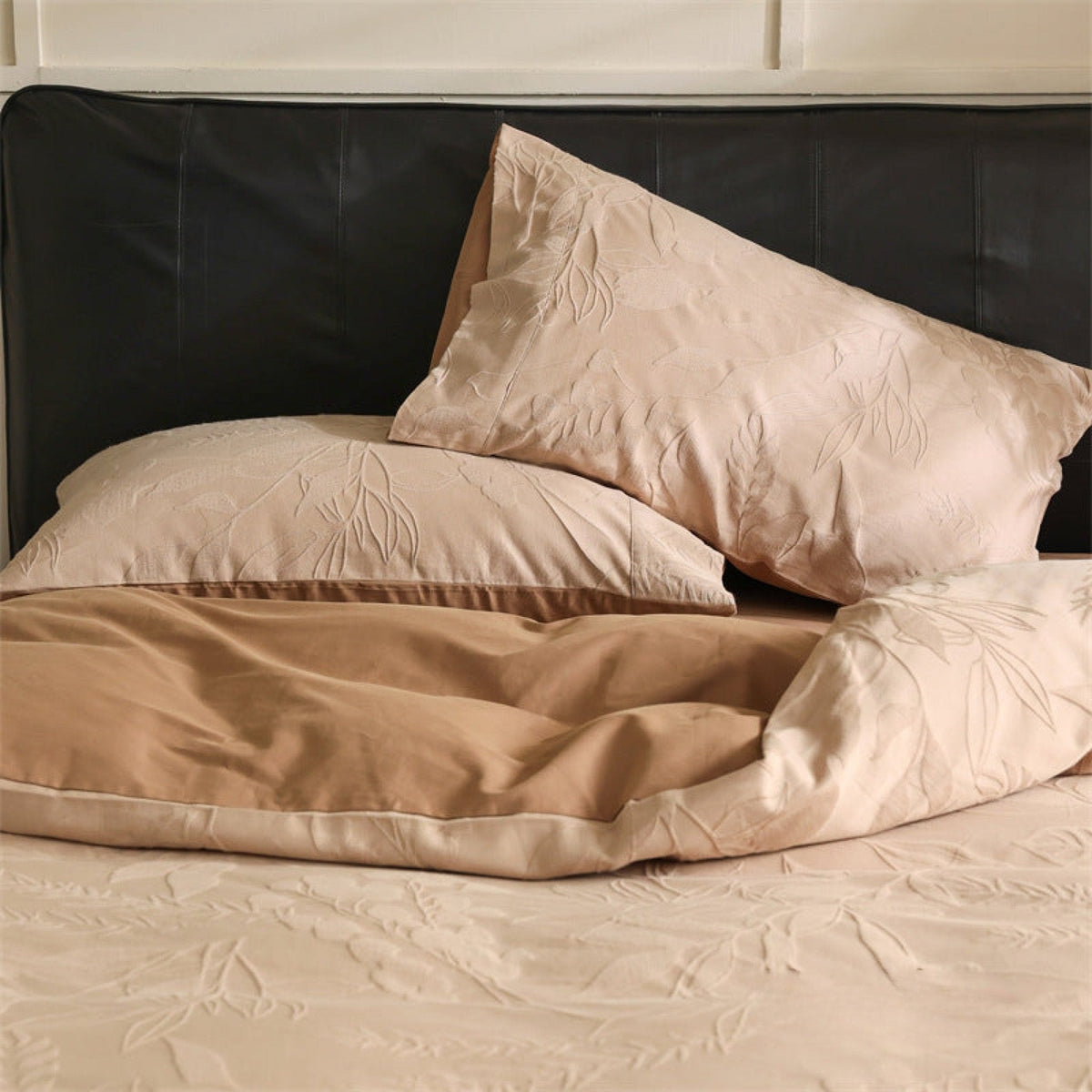 Brushed cotton jacquard bedding set – Apricot Orchid, close view of jacquard fabric and pillows - Roomden