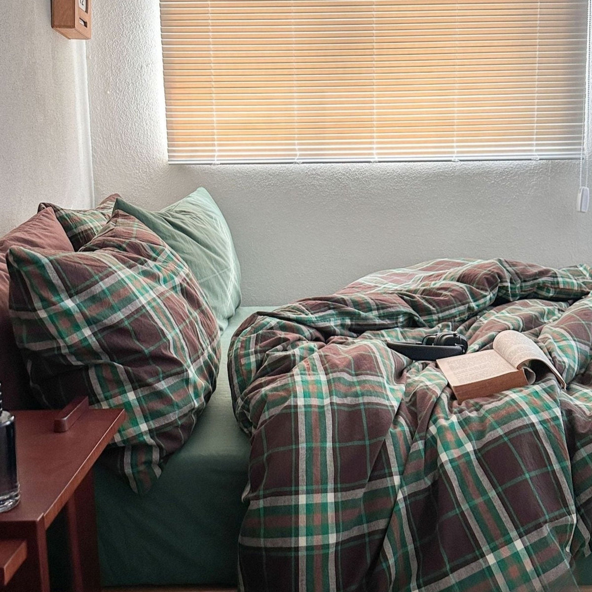 Kirkwood Plaid Cotton Bedding Set – side view of green plaid bedding near the window - Roomden