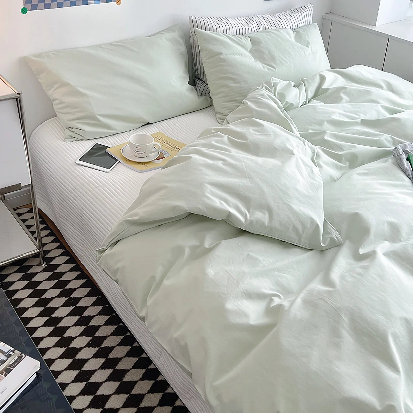 Soft pastel solid washed cotton duvet cover and pillowcases in a cozy minimalist bedroom – RoomDen