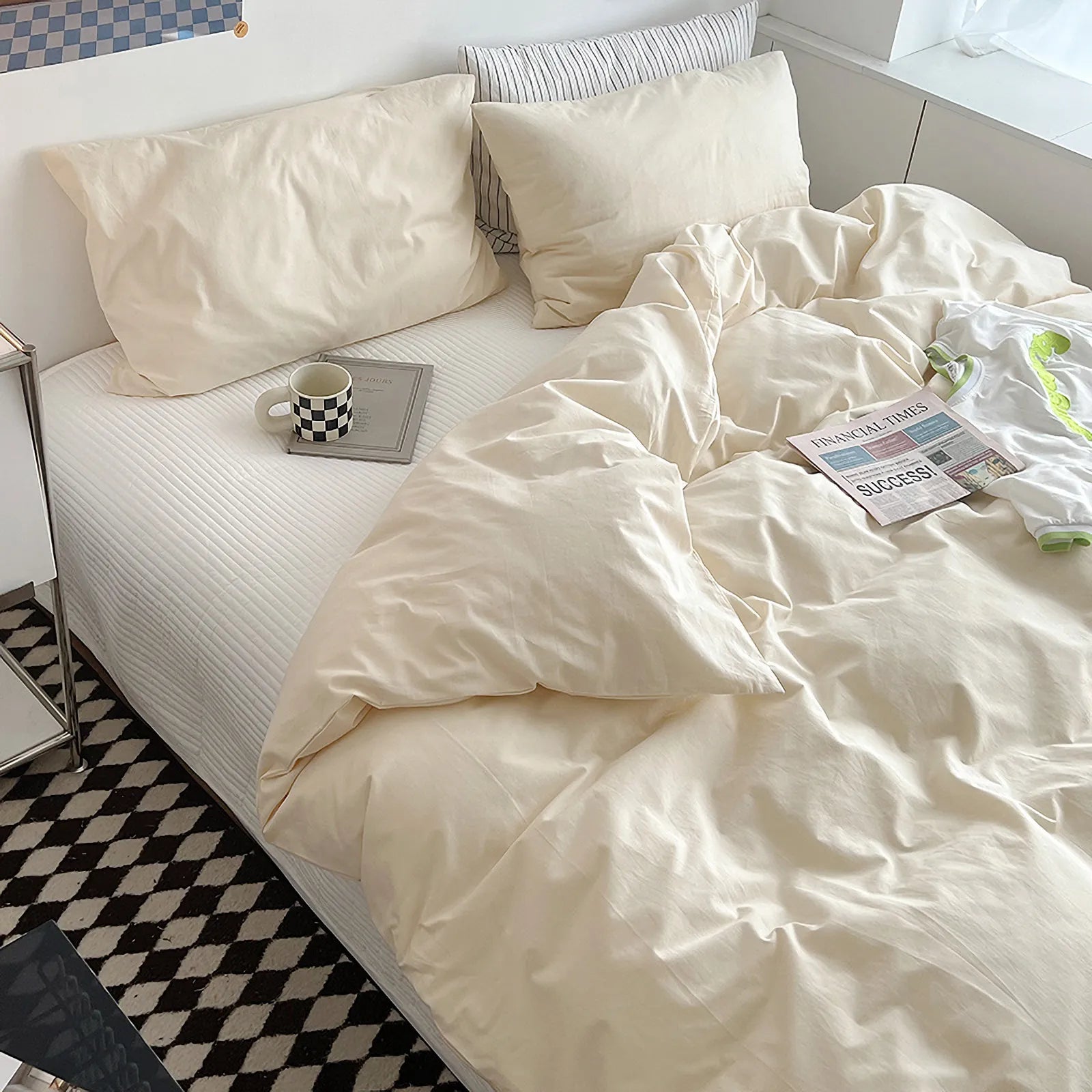 Soft pastel solid washed cotton duvet cover and pillowcases in a cozy minimalist bedroom – RoomDen