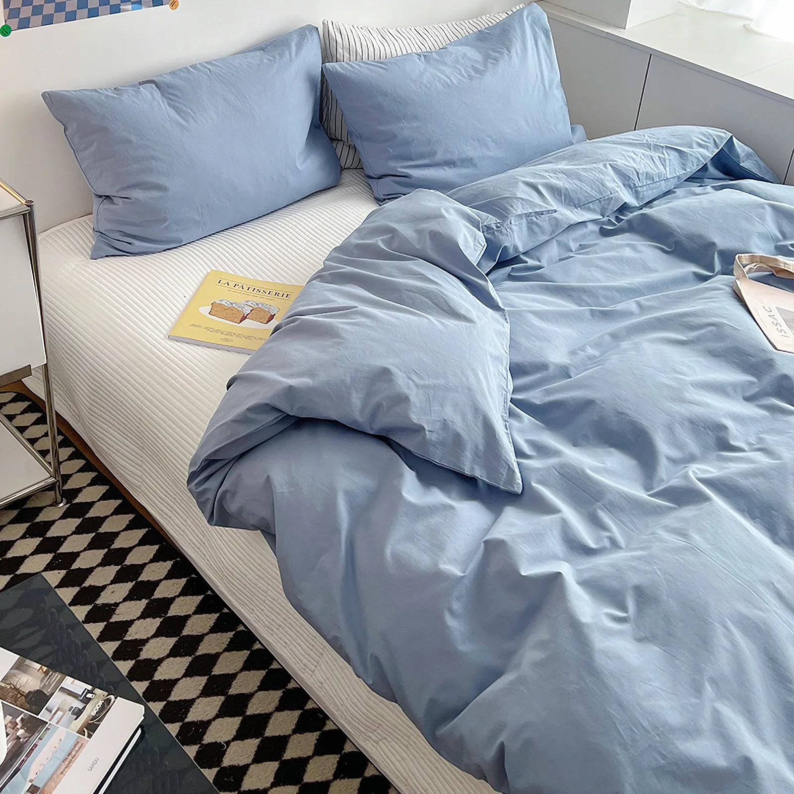 Soft pastel solid washed cotton duvet cover and pillowcases in a cozy minimalist bedroom – RoomDen