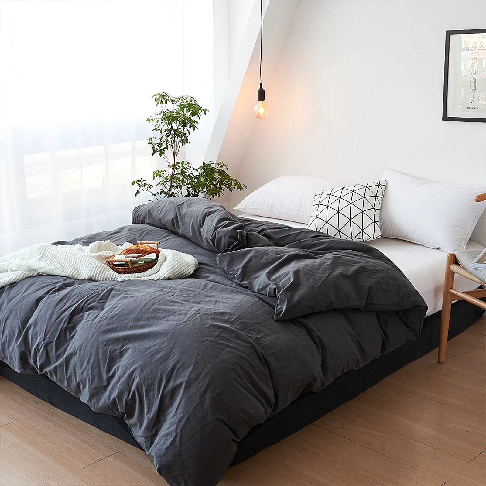 Soft pastel solid washed cotton duvet cover and pillowcases in a cozy minimalist bedroom – RoomDen
