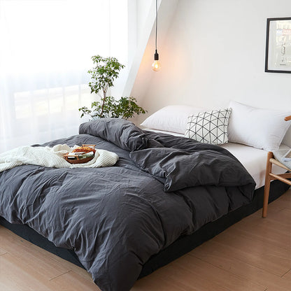 Soft pastel solid washed cotton duvet cover and pillowcases in a cozy minimalist bedroom – RoomDen