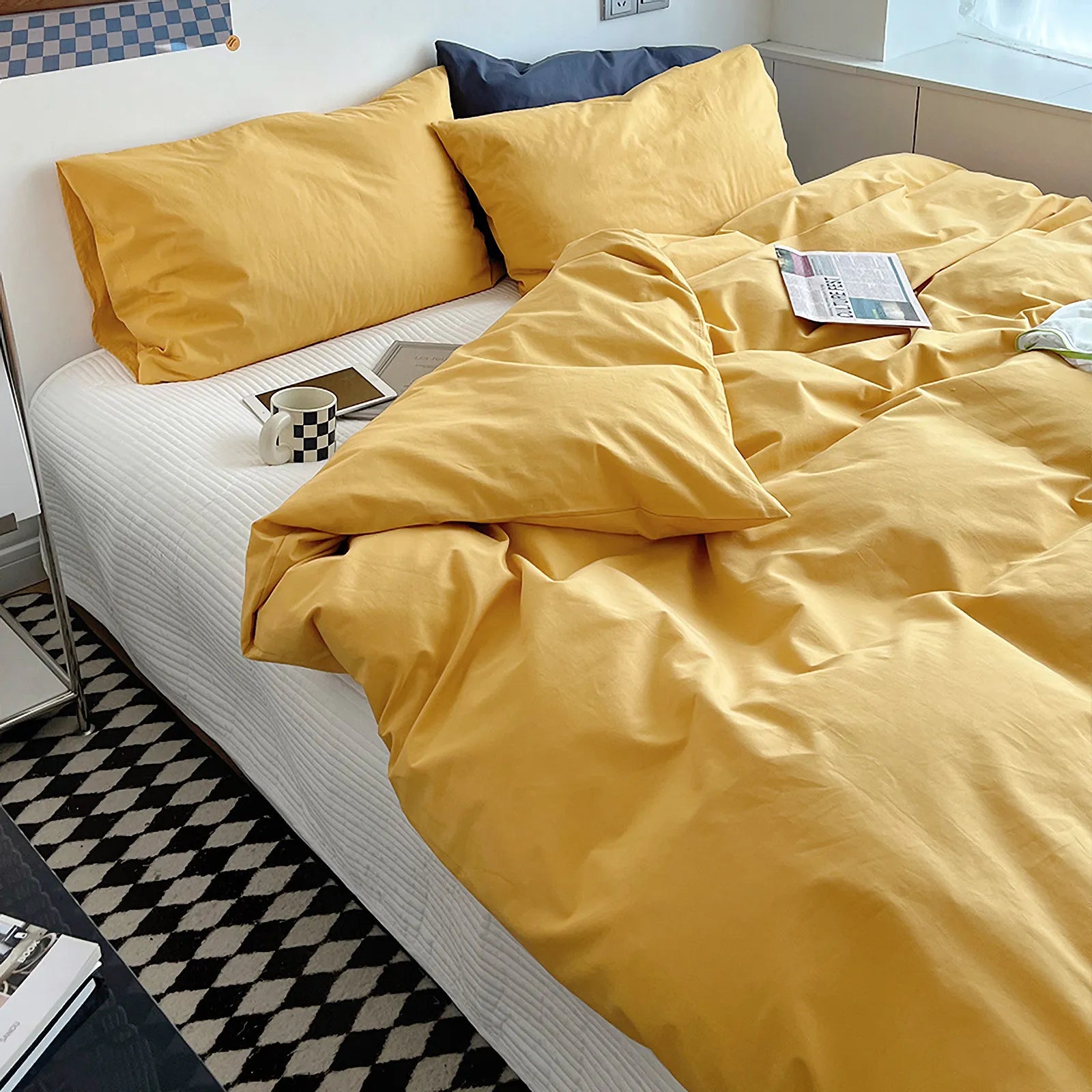 Soft pastel solid washed cotton duvet cover and pillowcases in a cozy minimalist bedroom – RoomDen