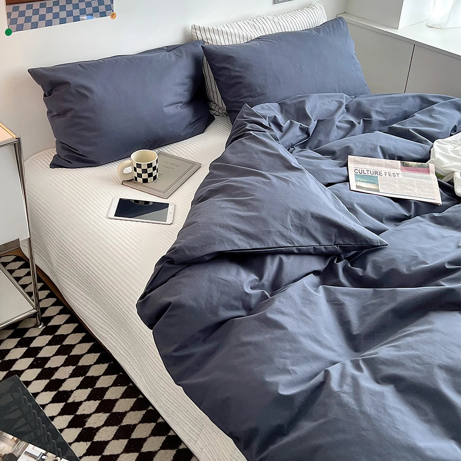 Soft pastel solid washed cotton duvet cover and pillowcases in a cozy minimalist bedroom – RoomDen