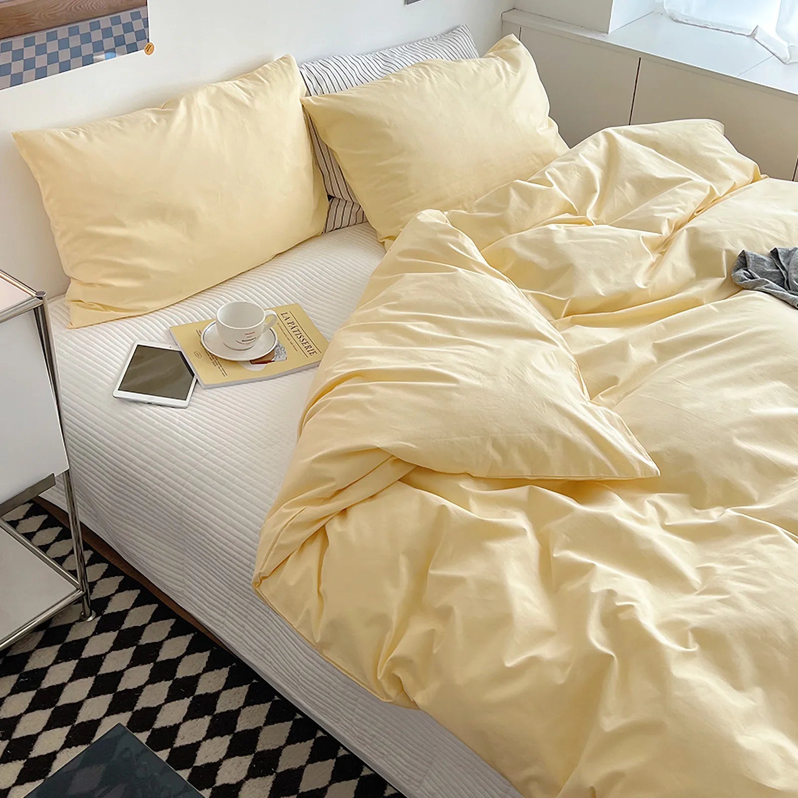 Soft pastel solid washed cotton duvet cover and pillowcases in a cozy minimalist bedroom – RoomDen