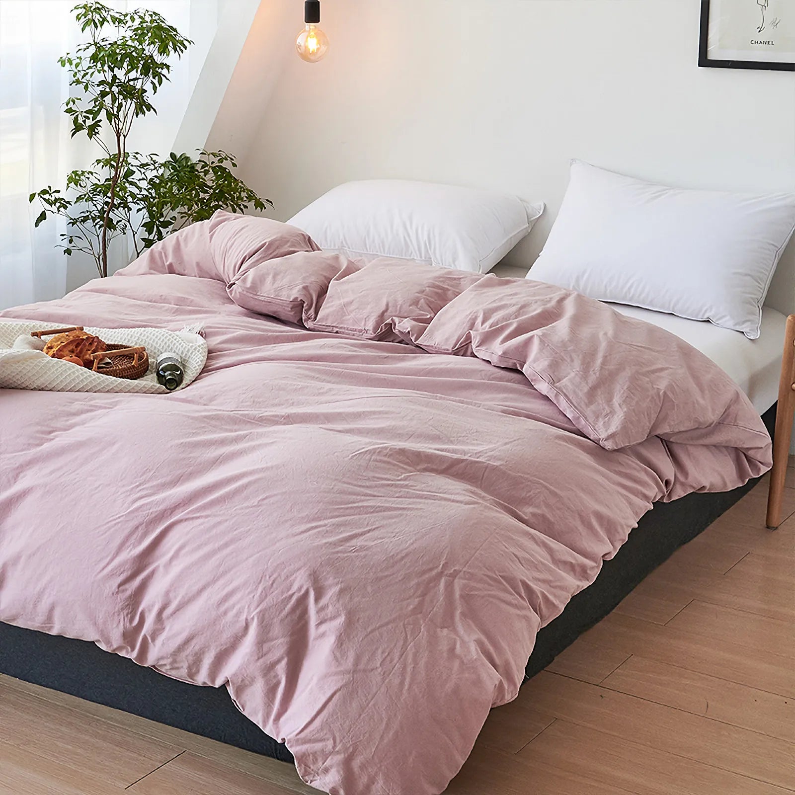 Soft pastel solid washed cotton duvet cover and pillowcases in a cozy minimalist bedroom – RoomDen