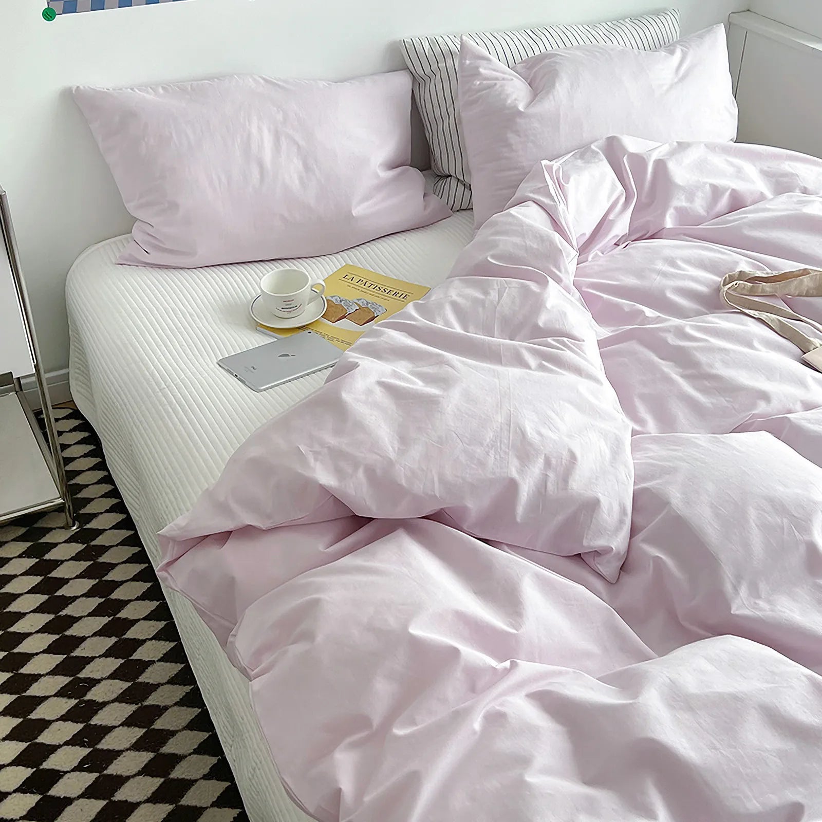 Soft pastel solid washed cotton duvet cover and pillowcases in a cozy minimalist bedroom – RoomDen