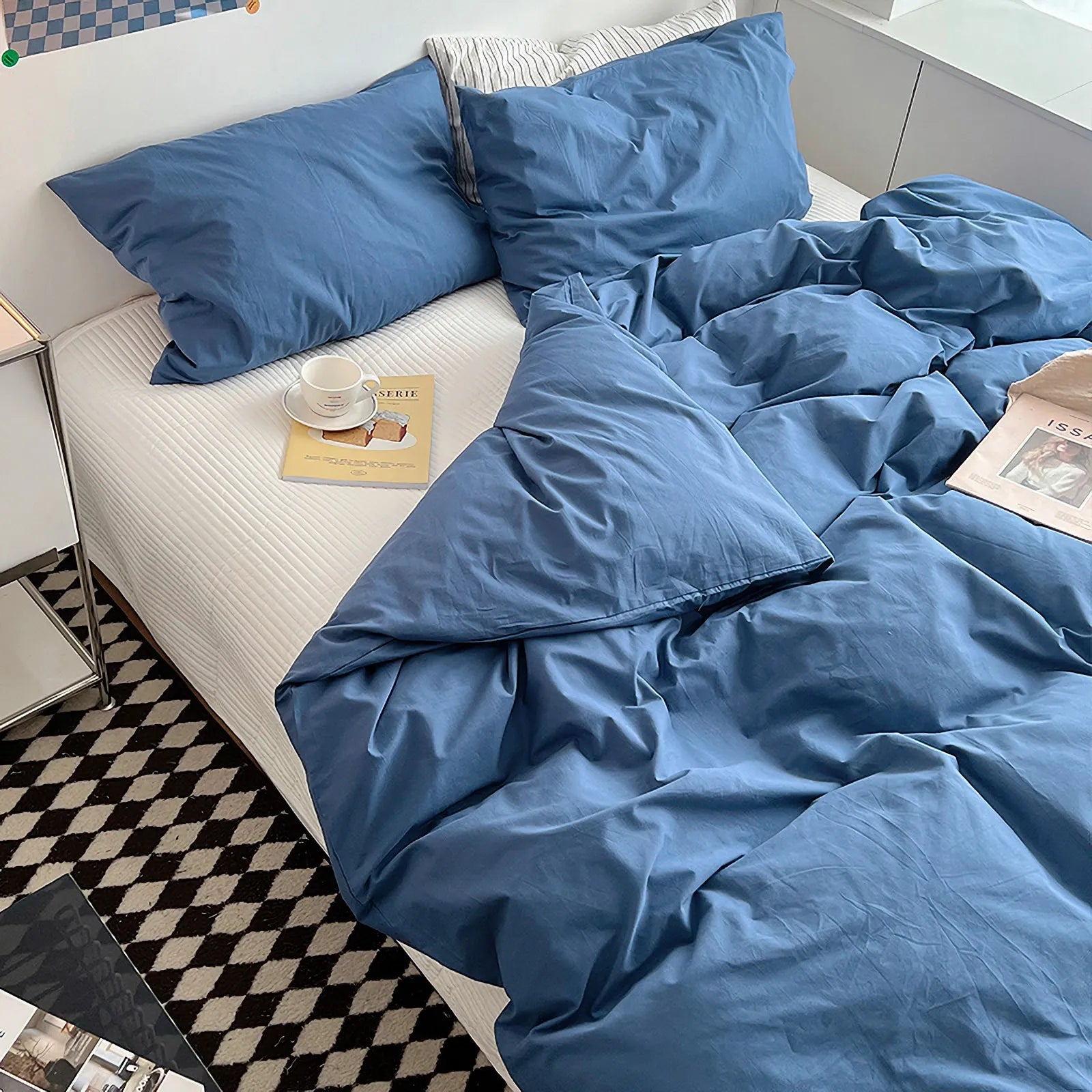 Soft pastel solid washed cotton duvet cover and pillowcases in a cozy minimalist bedroom – RoomDen