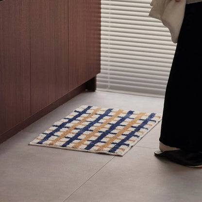 Lifestyle shot of person standing next to the checkered rug near a window - RoomDen
