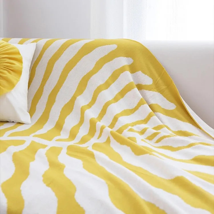 Leaf pattern flannel fleece throw blanket in a modern cozy home setting – RoomDen