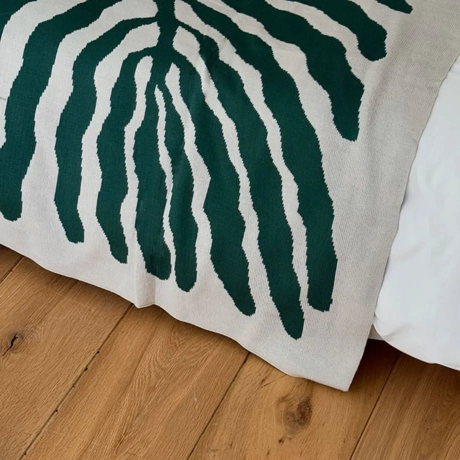 Leaf pattern flannel fleece throw blanket in a modern cozy home setting – RoomDen