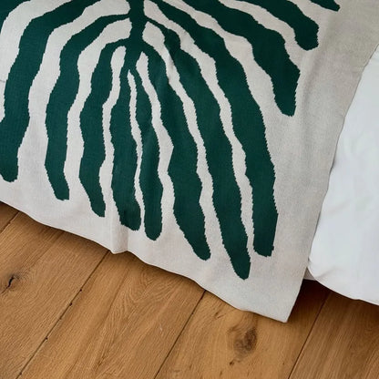 Leaf pattern flannel fleece throw blanket in a modern cozy home setting – RoomDen