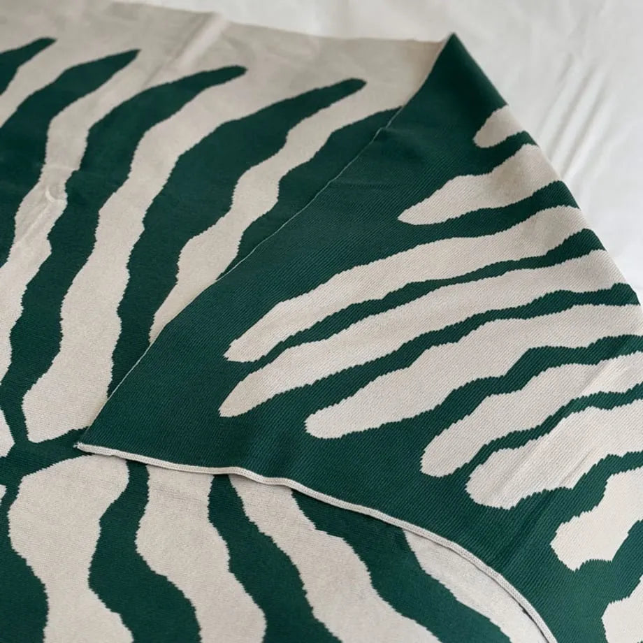 Leaf pattern flannel fleece throw blanket in a modern cozy home setting – RoomDen