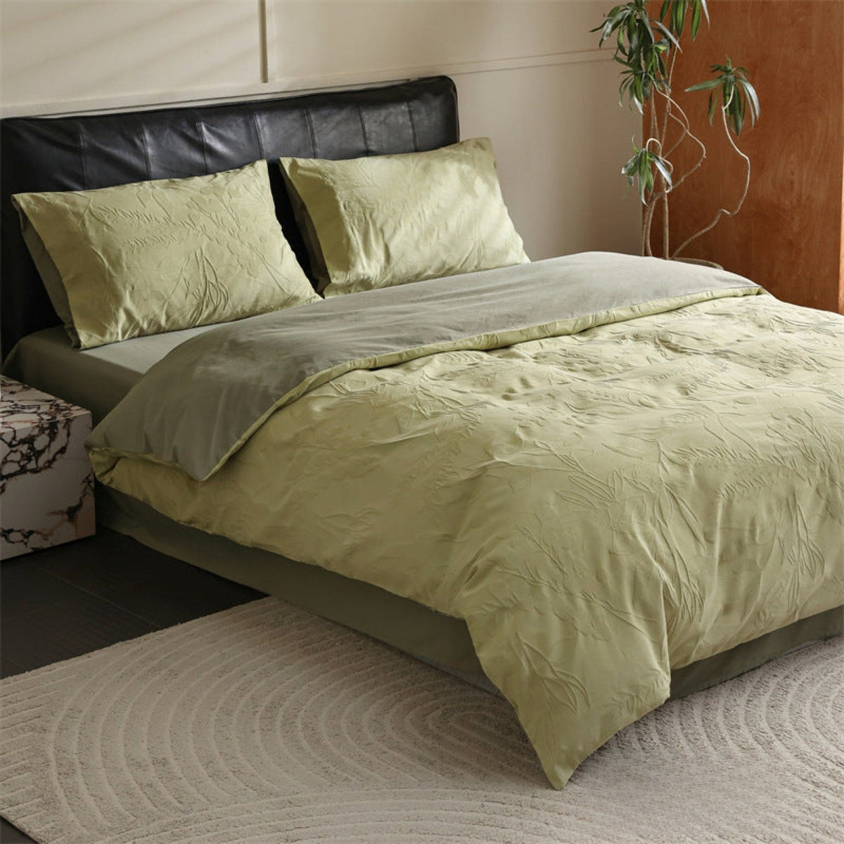 Brushed cotton jacquard bedding set – Pistachio Leaf, alternate view of the duvet and pillows - Roomden