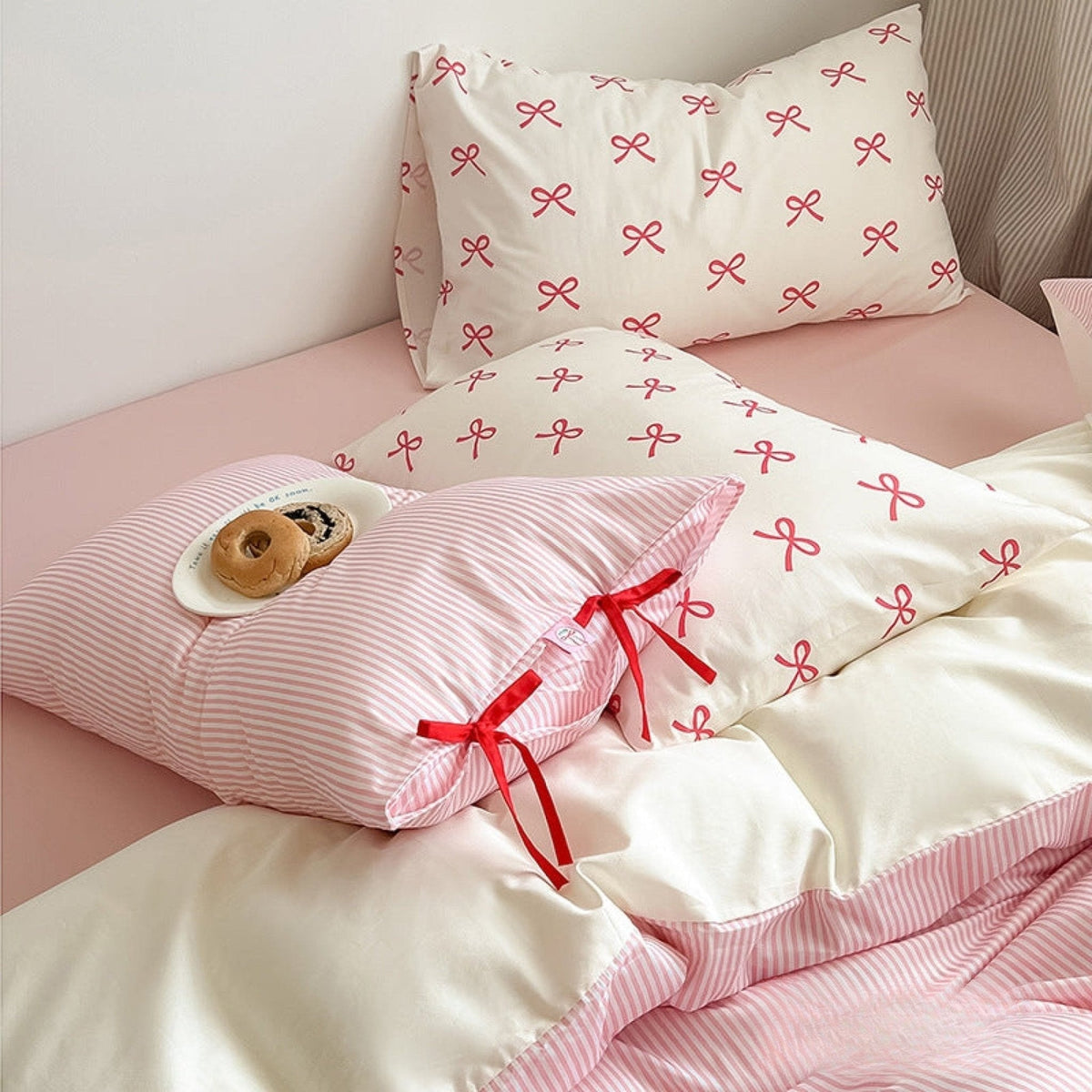 Bow striped cotton bedding set – Petal Pink, coordinated duvet and pillow view - Roomden