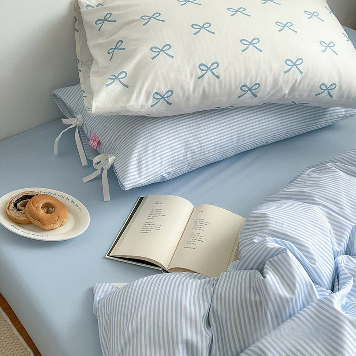 Bow striped cotton bedding set – Powder Blue, striped fabric, ribbon ties and pillow detail - Roomden