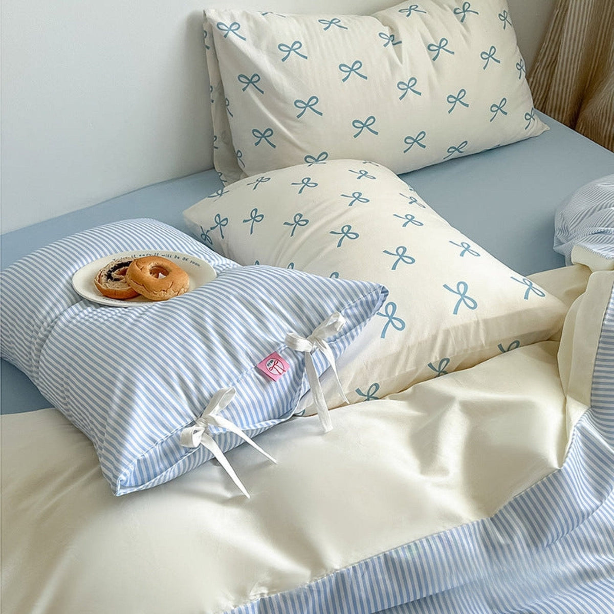 Bow striped cotton bedding set – Powder Blue, striped fabric, ribbon ties and pillow detail - Roomden
