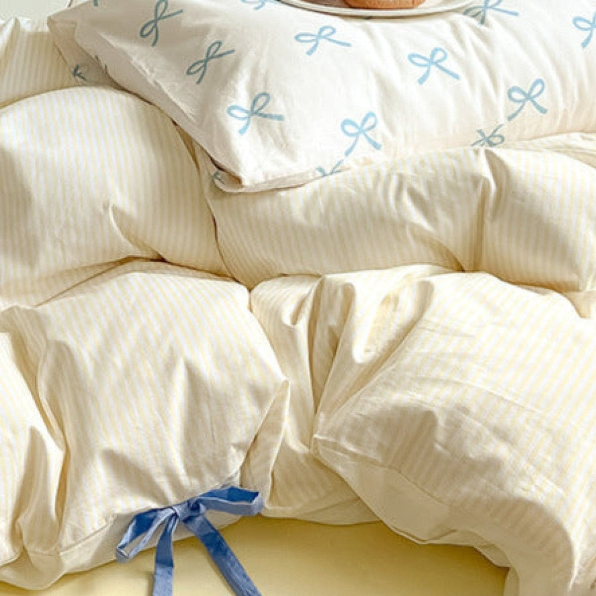 Bow striped cotton bedding set – Butter Yellow, coordinated duvet and pillow view - Roomden