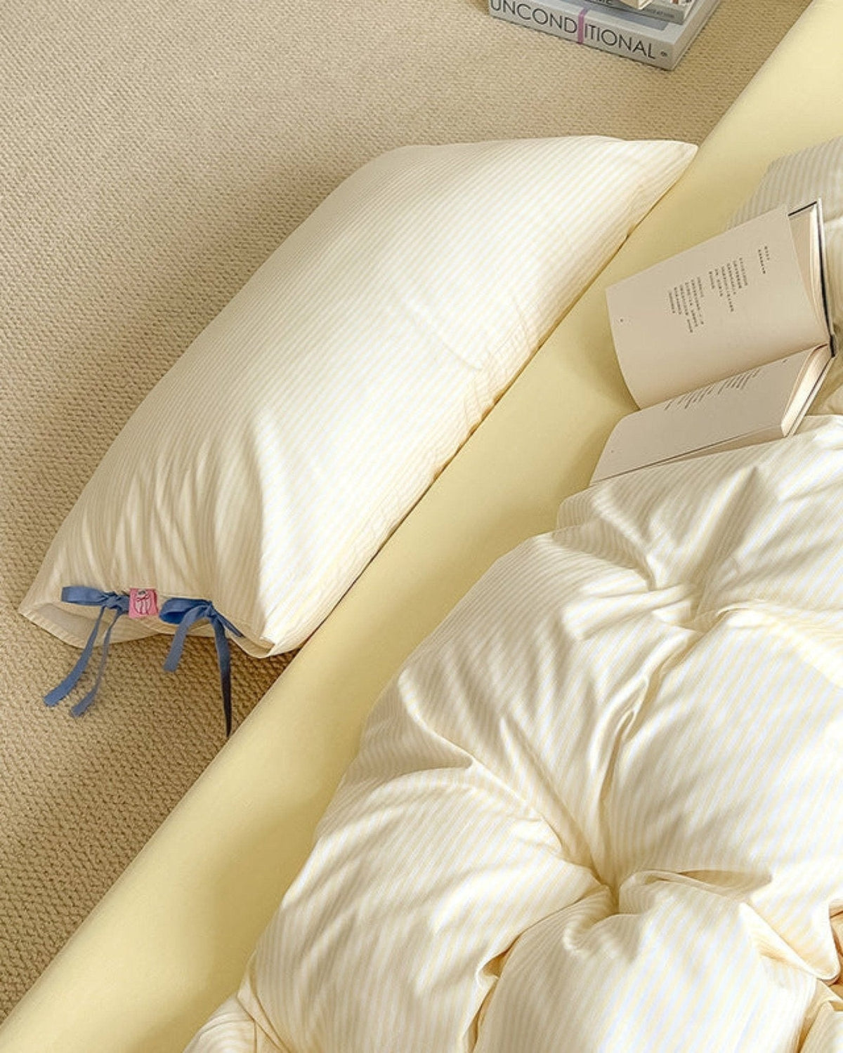 Bow striped cotton bedding set – Butter Yellow, striped fabric, ribbon ties and pillow detail - Roomden