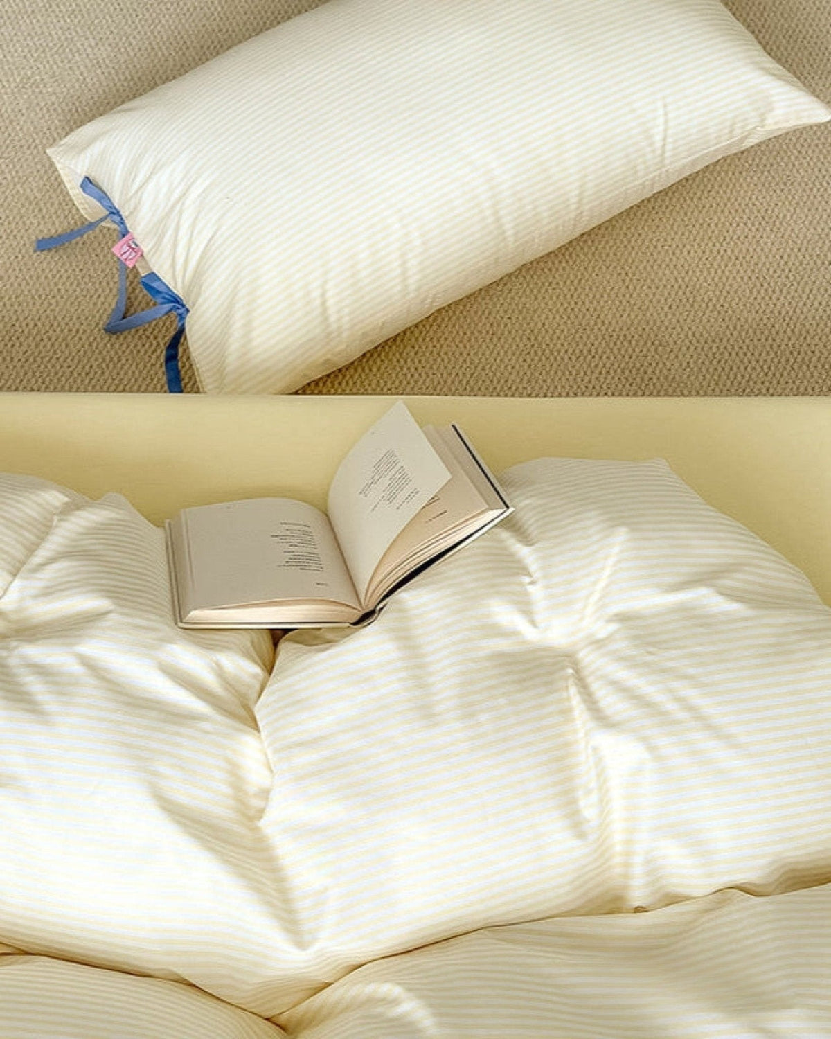 Bow striped cotton bedding set – Butter Yellow, striped fabric, ribbon ties and pillow detail - Roomden