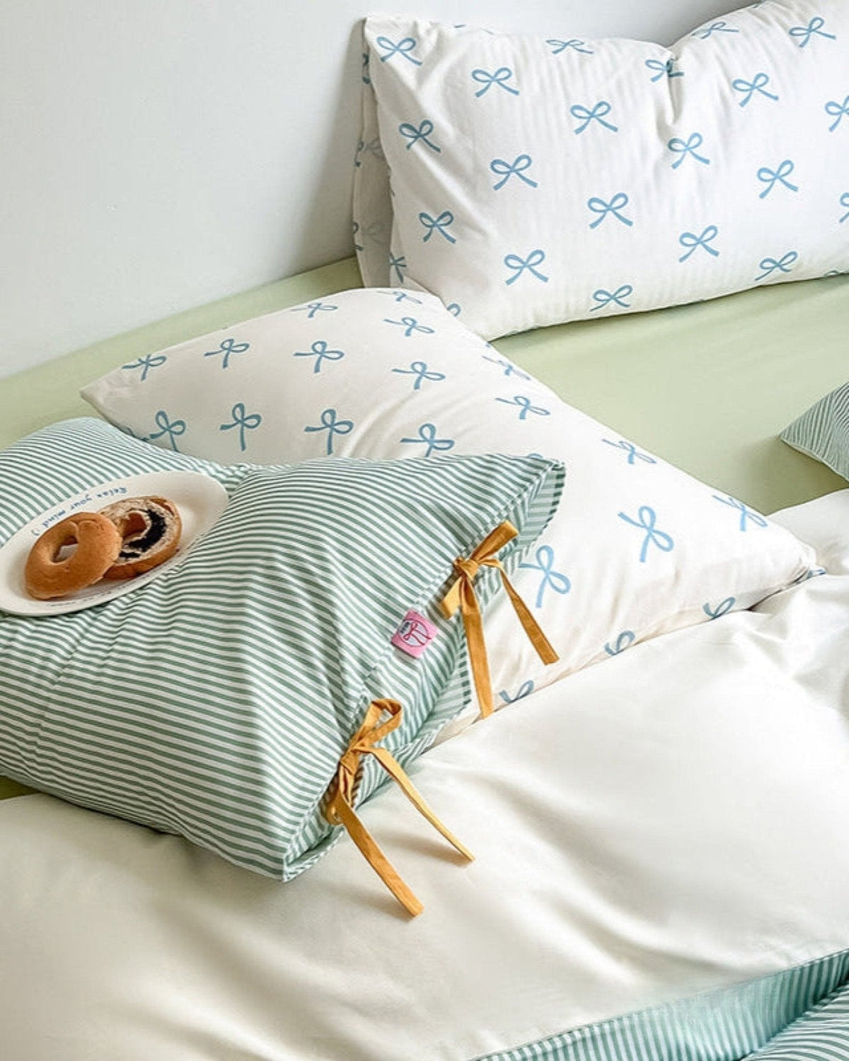 Bow striped cotton bedding set – Sage Green, coordinated duvet and pillow view - Roomden