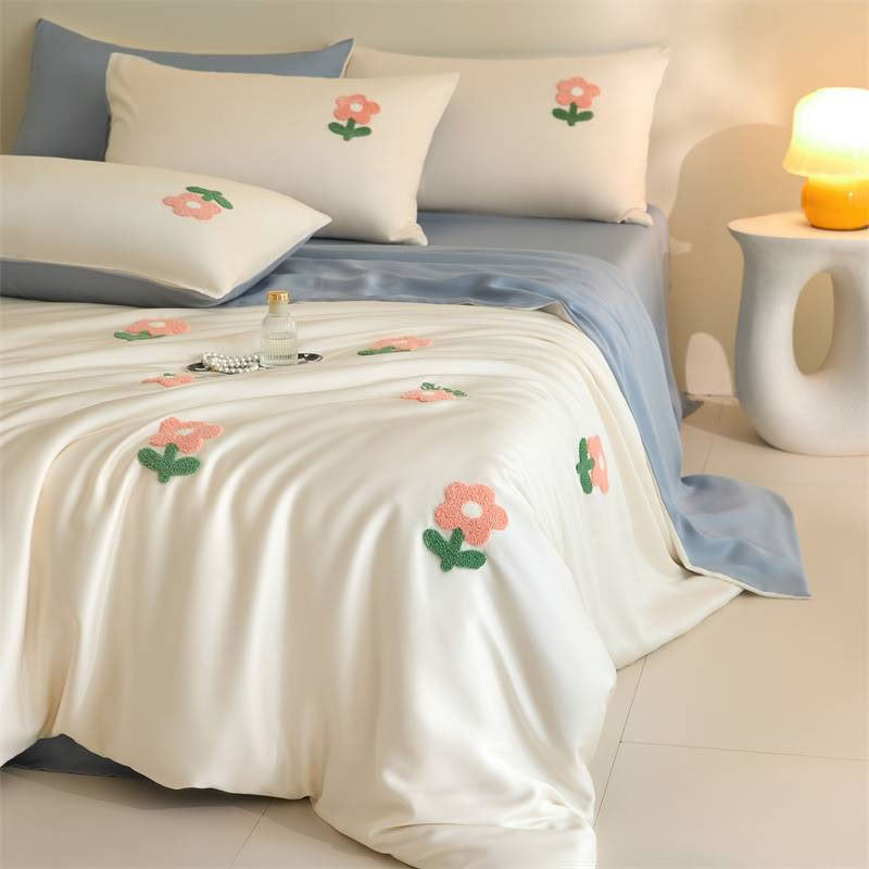 Soft pastel floral Cooling Tencel bedding set in blue and white color palette - RoomDen