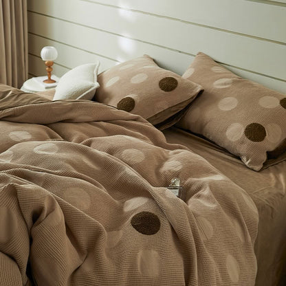Brown polka dot waffle cotton and flannel fleece bedding set on bed – RoomDen