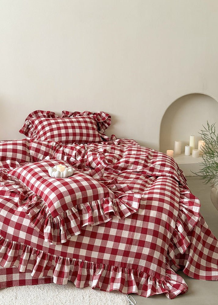 Camille Ruffle Gingham Double Gauze Bedding Set – angled view of red checked duvet and pillows - Roomden