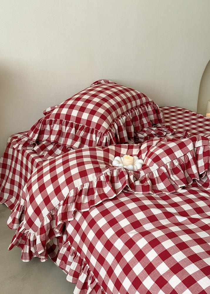 Camille Ruffle Gingham Double Gauze Bedding Set – red checked duvet folds beside a matching pillow - Roomden