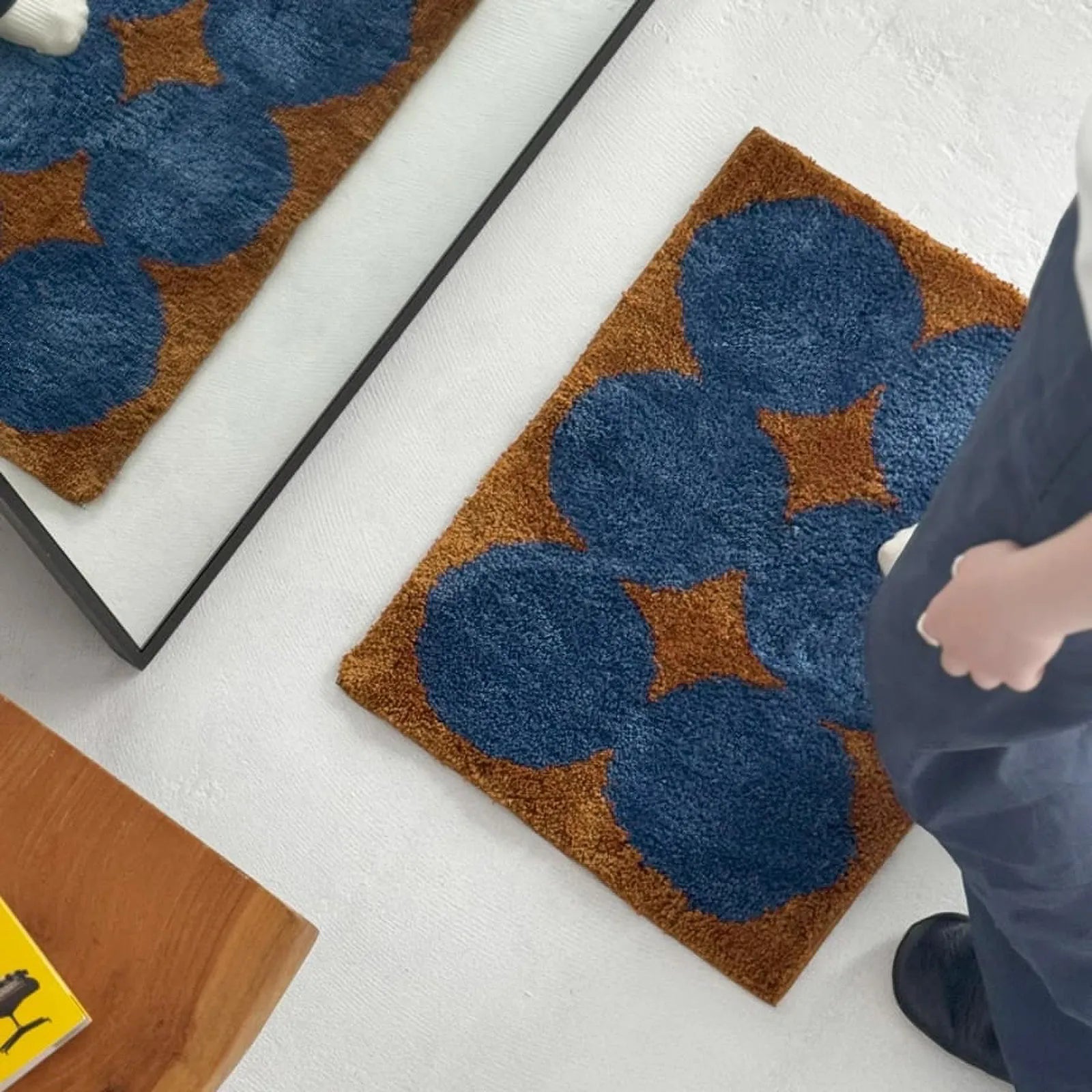 High-angle perspective of the rug's texture and pattern contrast - RoomDen