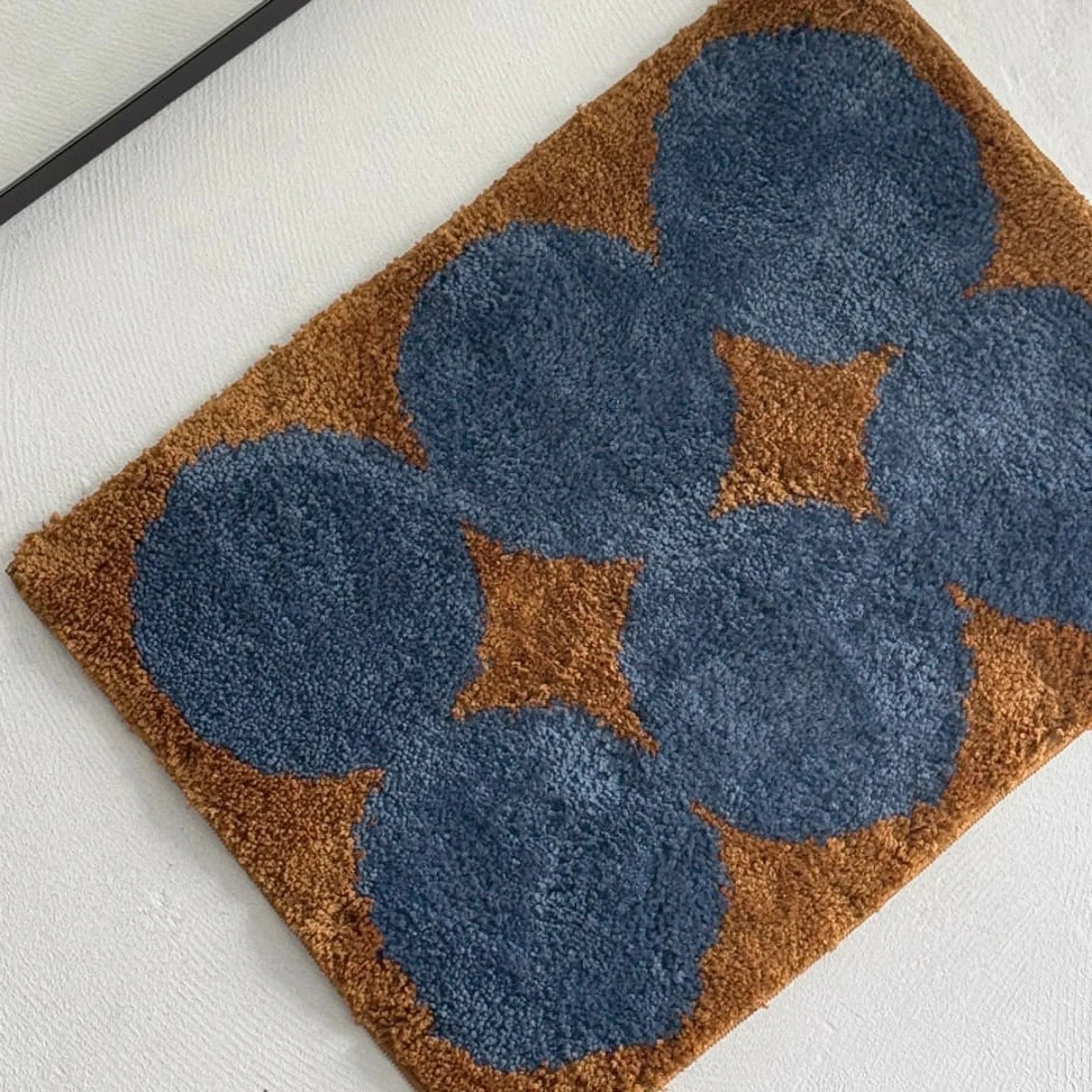 Top-down full view of the rectangular retro floral accent rug - RoomDen
