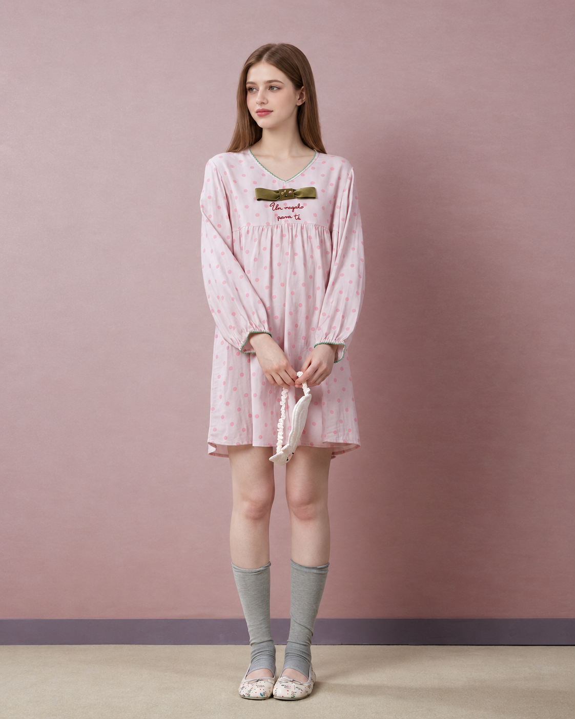 Polka Dot Bow Cotton Gauze Pajama Set – pink top styled alone, holding a sleep mask - Roomden