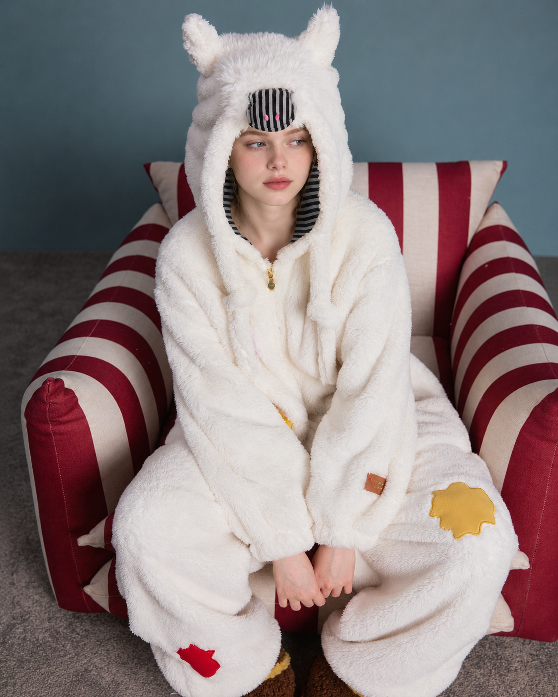 Pony Hood Fleece One-Piece Pajamas – front seated view showing the fleece and hood - Roomden