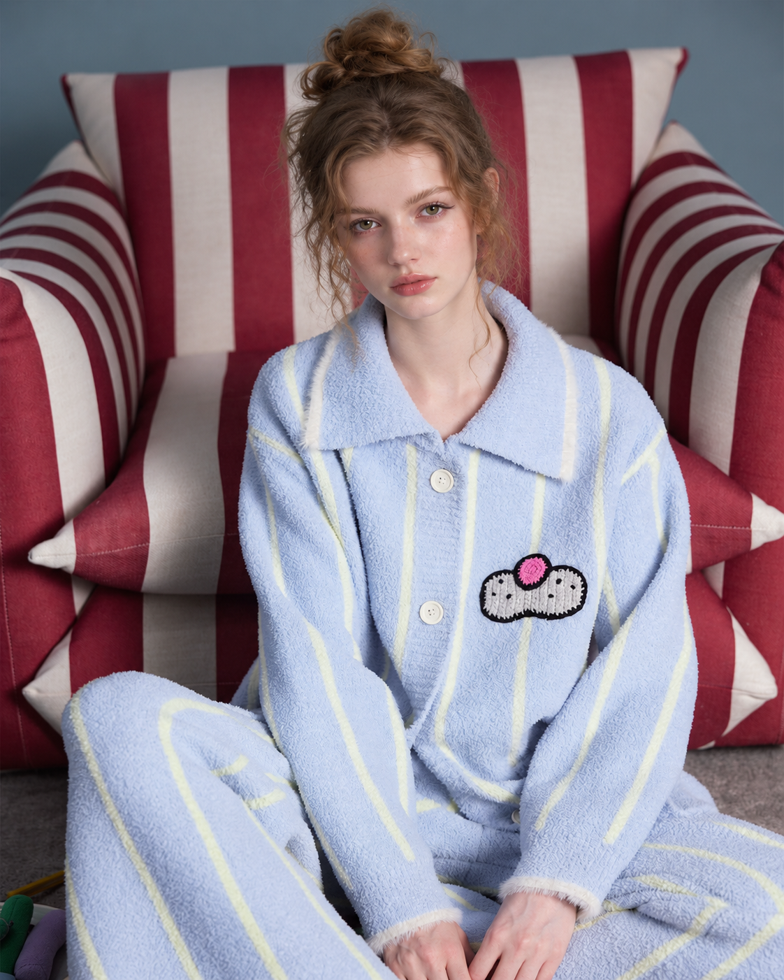 Striped Cat Motif Fleece Pajama Set – ice blue, seated in a striped armchair - Roomden