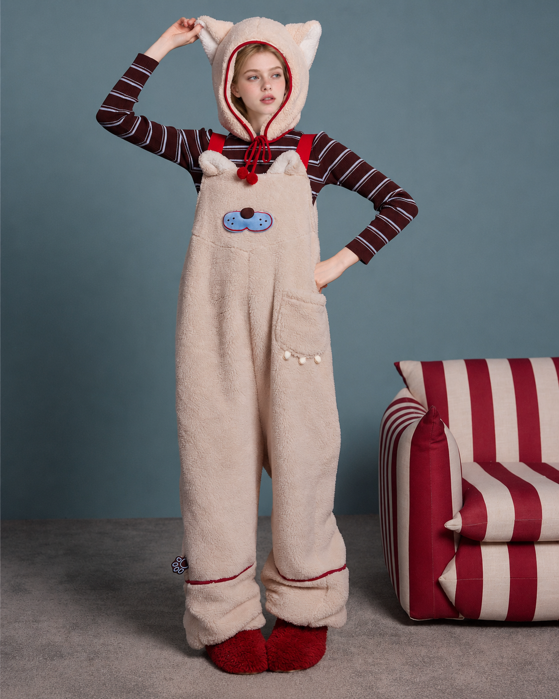 Cat-detail plush bib lounge pants – blush beige front view with red straps - Roomden