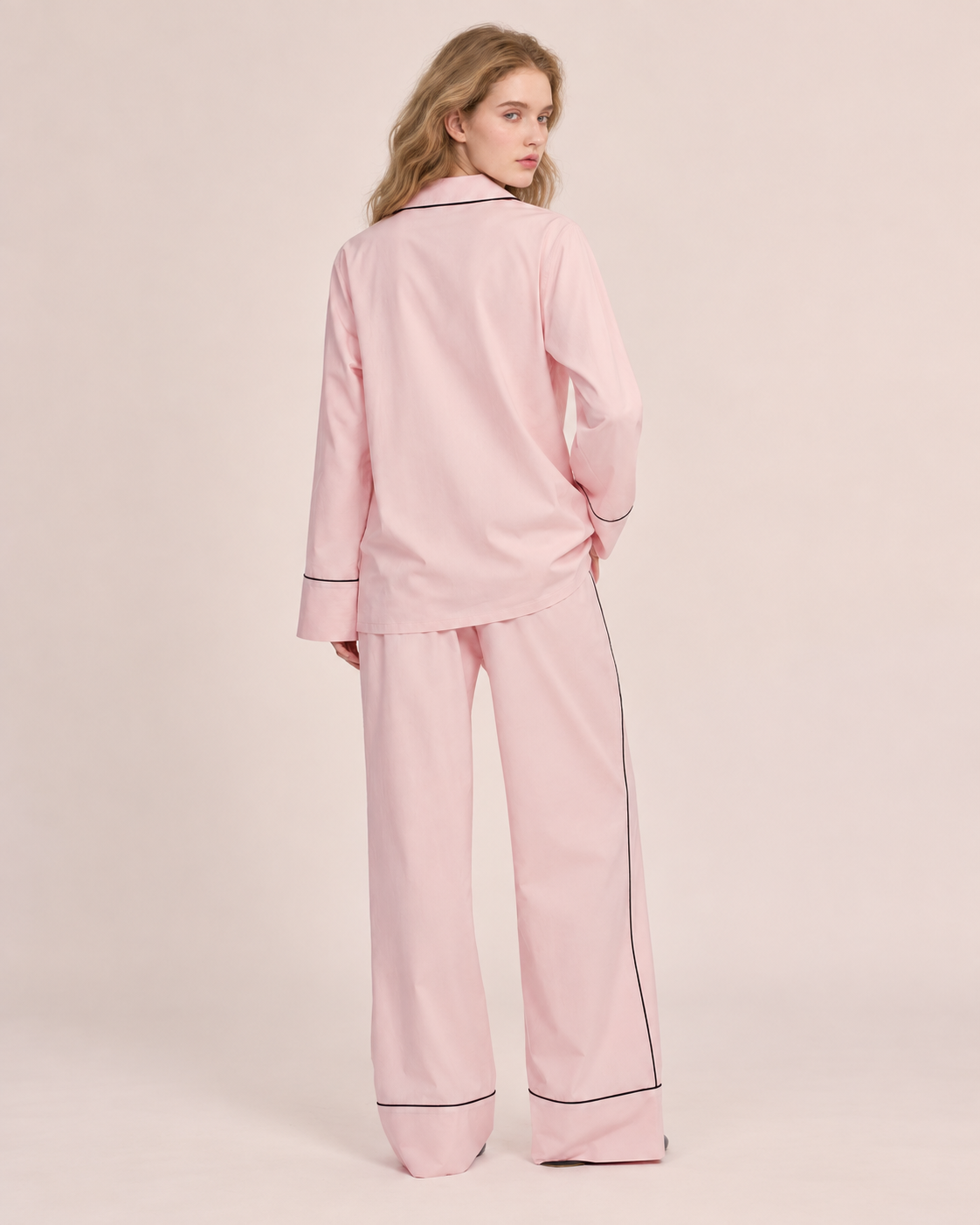 Linehaven contrast-piped pajama set in pink, back view - Roomden
