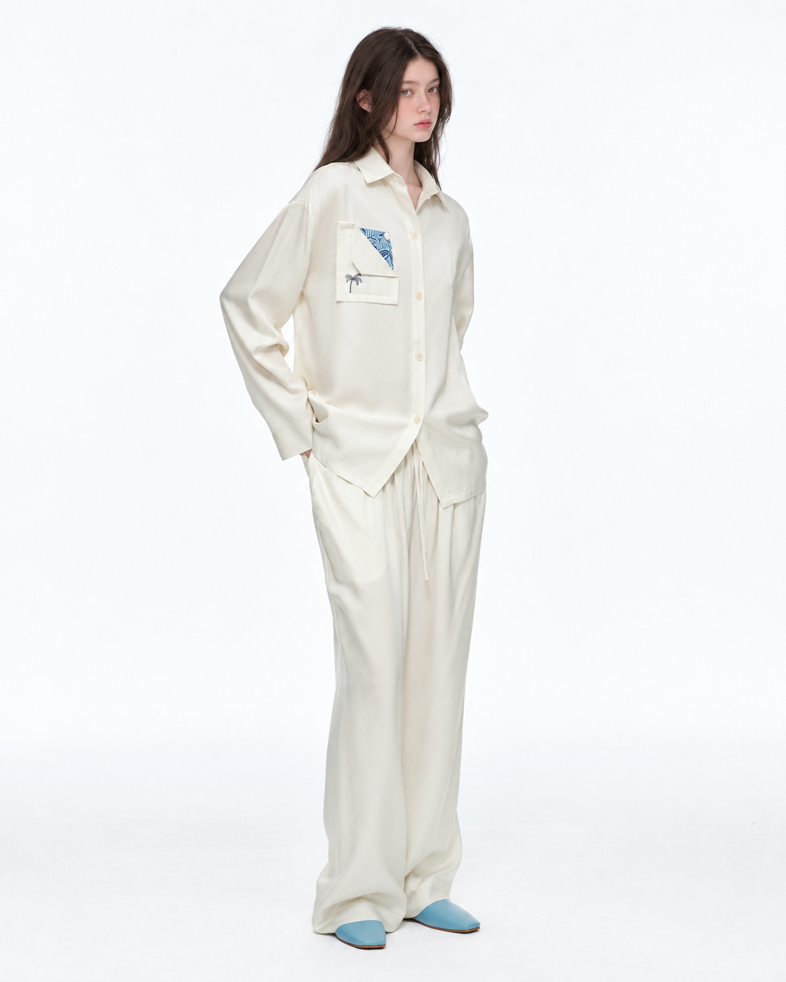 Inkshore botanical-pocket viscose pajama set in Milky White, side-front studio view - Roomden