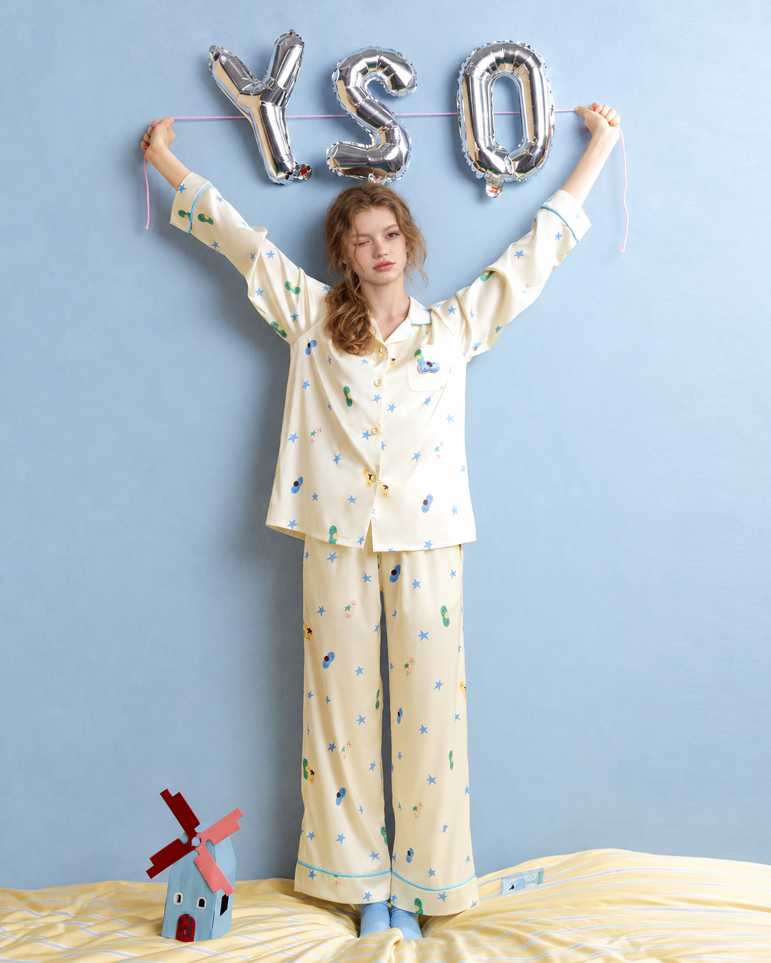 Cat & Star Satin Pajama Set – pale yellow full-length raised-arm pose - Roomden