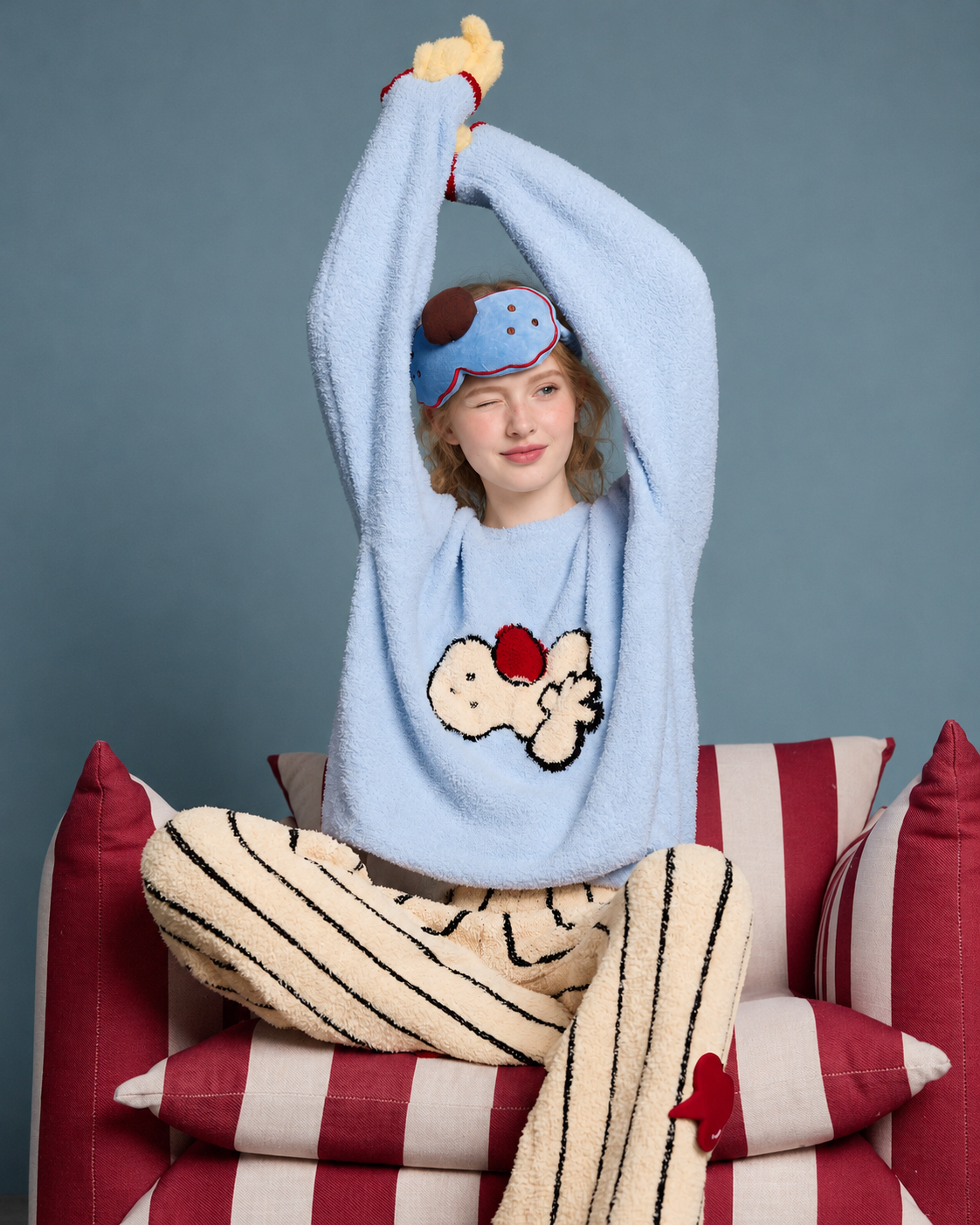 Cat Motif Plush Pajama Set – ice-blue cat top and striped pants in a seated stretch - Roomden