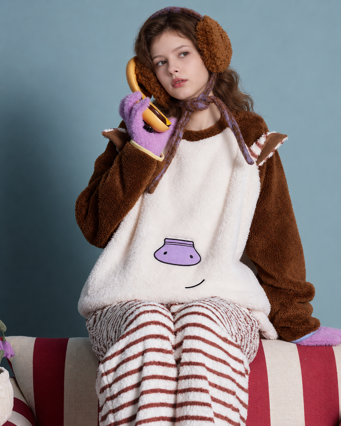 Horse-Ear Flannel Pajama Set – seated view holding a yellow telephone - Roomden