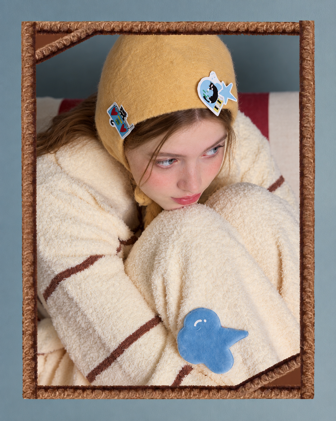 Striped Cat Fleece Pajama Set – framed close-up of the fleece set and blue leg appliqué - Roomden