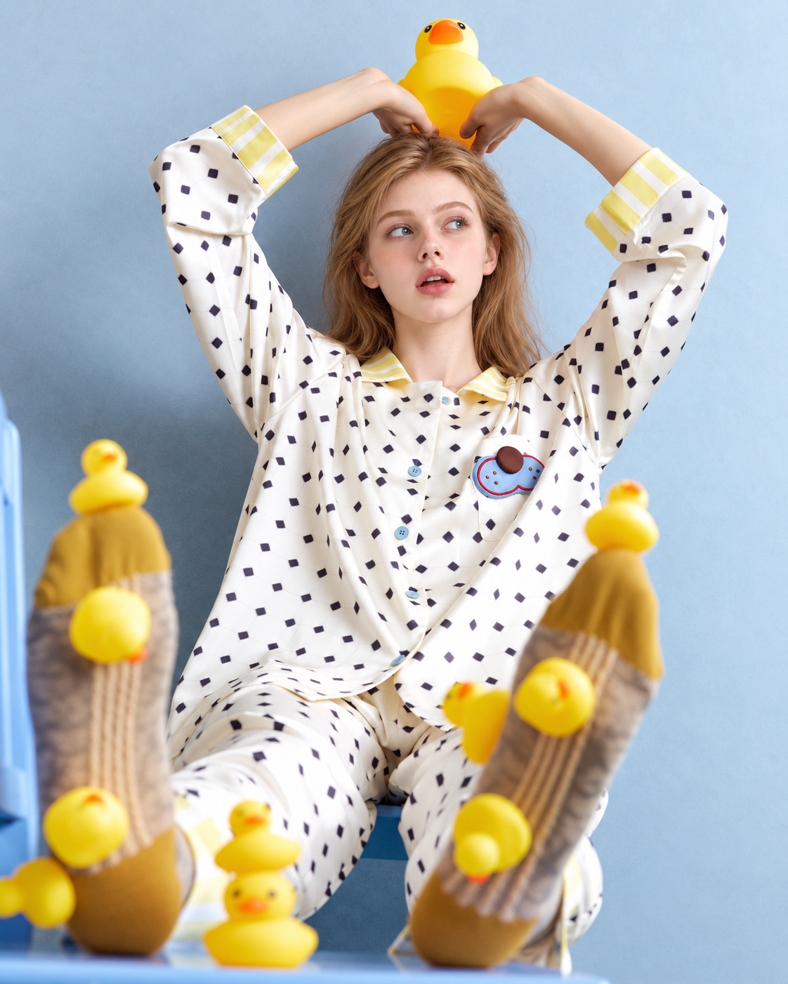 Lemonpause blue cat long-sleeve pajama set – raised arms and foreground feet in a duck scene - Roomden